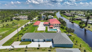 This nearly completed WATERFRONT TRIPLEX in Rotonda West, FL, is