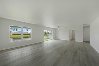 This nearly completed WATERFRONT TRIPLEX in Rotonda West, FL, is