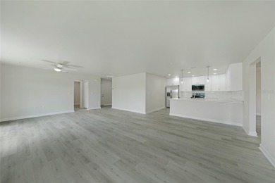 This nearly completed WATERFRONT TRIPLEX in Rotonda West, FL, is