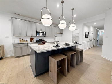 This home showcases a refined blend of modern and timeless - photo 5