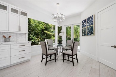 Come see this meticulously renovated residence is located in the - photo 13