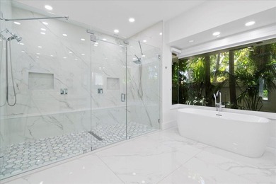 Come see this meticulously renovated residence is located in the - photo 22