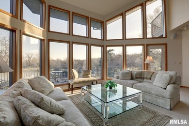 Experience lakefront living with exceptional light, volume and - photo 2