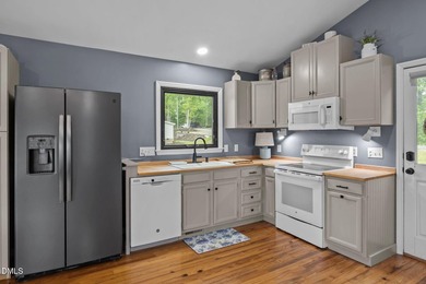 HUGE PRICE IMPROVEMENT!! Exquisite waterfront retreat on the - photo 11
