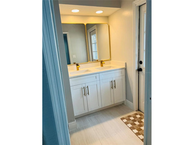 Fully remodeled, this stunning 3-bedroom, 2-bath single-family - photo 18