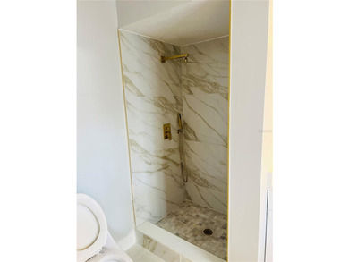 Fully remodeled, this stunning 3-bedroom, 2-bath single-family - photo 19