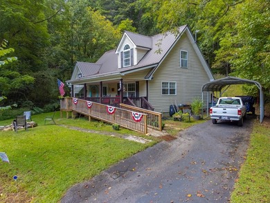 Peaceful mountain living with space for projects! This charming