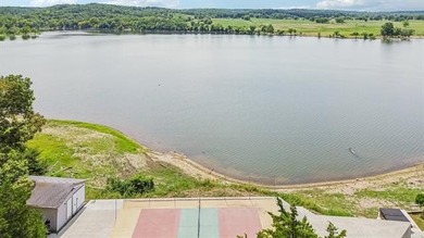 MOTIVATED SELLER! This extraordinary Lake Hudson estate blends - photo 54