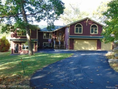 Lake Home For Sale in West Bloomfield, Michigan