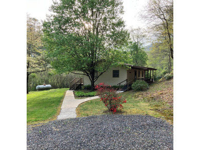 Welcome to your Creekfront Oasis, located in the sought-after