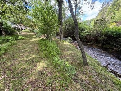 Welcome to your Creekfront Oasis, located in the sought-after