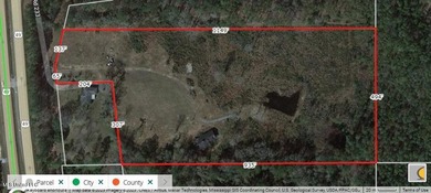 Mostly high dry cleared acreage with two ponds just outside city - photo 2