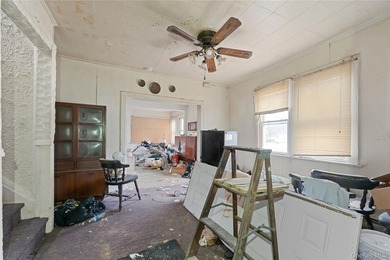 Three-bedroom bungalow with unfinished basement, large back yard - photo 7