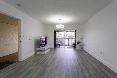 Step into this beautifully remodeled apartment in the heart of - photo 2