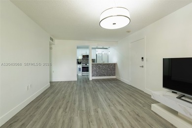 Step into this beautifully remodeled apartment in the heart of - photo 3