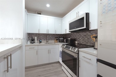 Step into this beautifully remodeled apartment in the heart of - photo 7