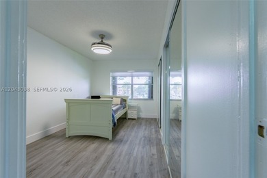 Step into this beautifully remodeled apartment in the heart of - photo 10