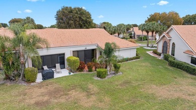 FRESHLY PAINTED OUTSIDE! Welcome to this spacious villa that - photo 24