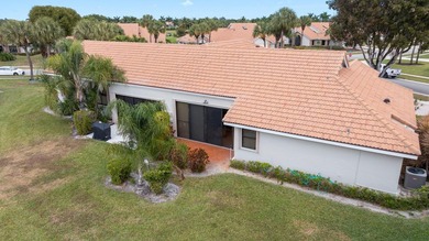 FRESHLY PAINTED OUTSIDE! Welcome to this spacious villa that - photo 25