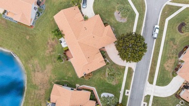 FRESHLY PAINTED OUTSIDE! Welcome to this spacious villa that - photo 27