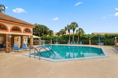 FRESHLY PAINTED OUTSIDE! Welcome to this spacious villa that - photo 30