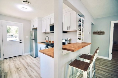 Lake life at its best! This completely remodeled - photo 7