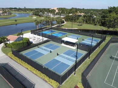 FRESHLY PAINTED OUTSIDE! Welcome to this spacious villa that - photo 39