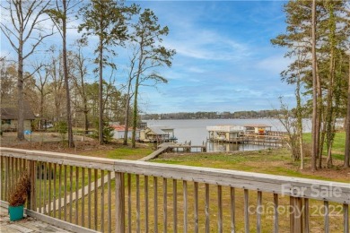 Huge outdoor living spaces including a large screened porch - Lake Home For Sale in Norwood, North Carolina