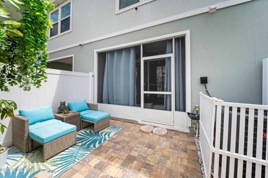 Nearly New Townhome with Backyard Oasis + Assumable 5.25% Loan! - photo 1