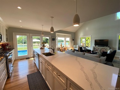 Waterfront living designed for effortless coastal comfort - photo 9