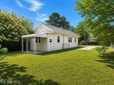 This buildable lot with existing driveway is next door to 1314 - photo 2