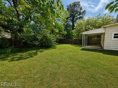 This buildable lot with existing driveway is next door to 1314 - photo 3
