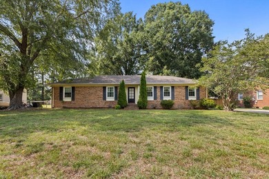 This lovely brick ranch offers an abundance of space with 4 - photo 1