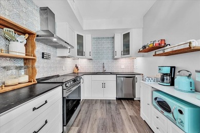 Stunning, completely renovated corner larger residence offers