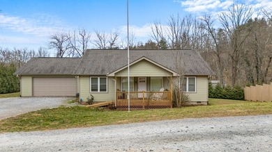 In town convenience with the comfort of main level living awaits