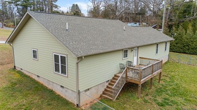 In town convenience with the comfort of main level living awaits