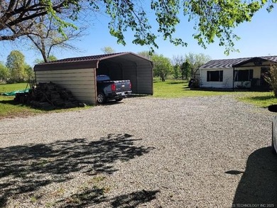 3BD/2BA double wide home on 2 nice lots and a community pond in - photo 3