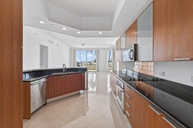 Located in the prestigious gated waterfront community of Marina - photo 9
