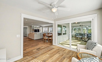 This impeccably redesigned oceanfront home blends luxury and - photo 21