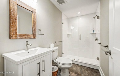 This impeccably redesigned oceanfront home blends luxury and - photo 23