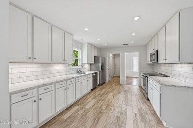 Welcome to this beautifully updated 1,990 sq ft home on a - photo 9