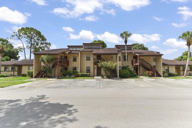 Welcome to this charming two-bedroom, two-bathroom condominium - photo 1