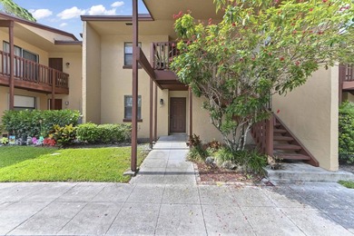 Welcome to this charming two-bedroom, two-bathroom condominium - photo 2