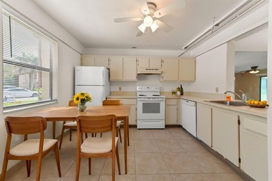 Welcome to this charming two-bedroom, two-bathroom condominium - photo 4