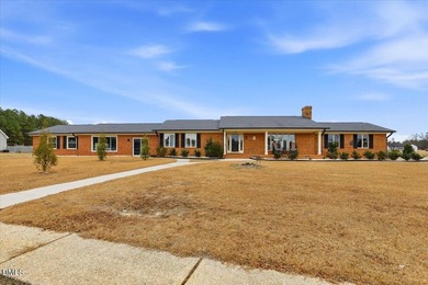 Brick ranch charm meets rare amenities in this one-of-a-kind - photo 2