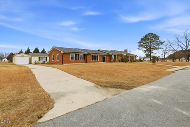 Brick ranch charm meets rare amenities in this one-of-a-kind - photo 3