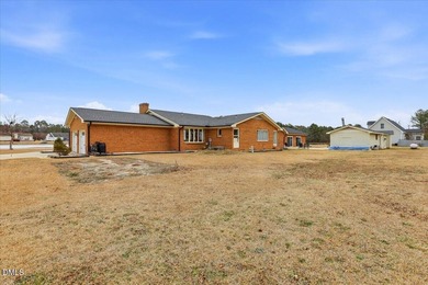 Brick ranch charm meets rare amenities in this one-of-a-kind - photo 8
