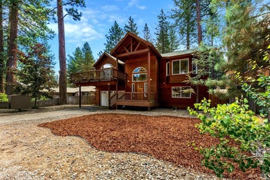 Located in the desirable Tahoe Island Park neighborhood, this - photo 1