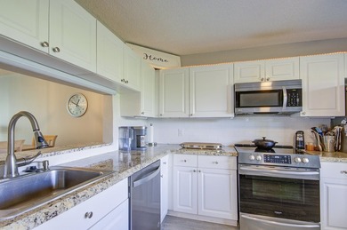 YOU WILL WANT THIS 1ST FLOOR... END UNIT ...WITH IMPACT GLASS - photo 5
