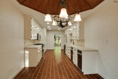 Tucked on a corner lot in Midwestern Park, this 4-bed, 3-bath - photo 15